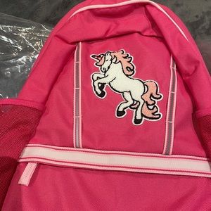 Girls hot pink unicorn backpack. New still in package.